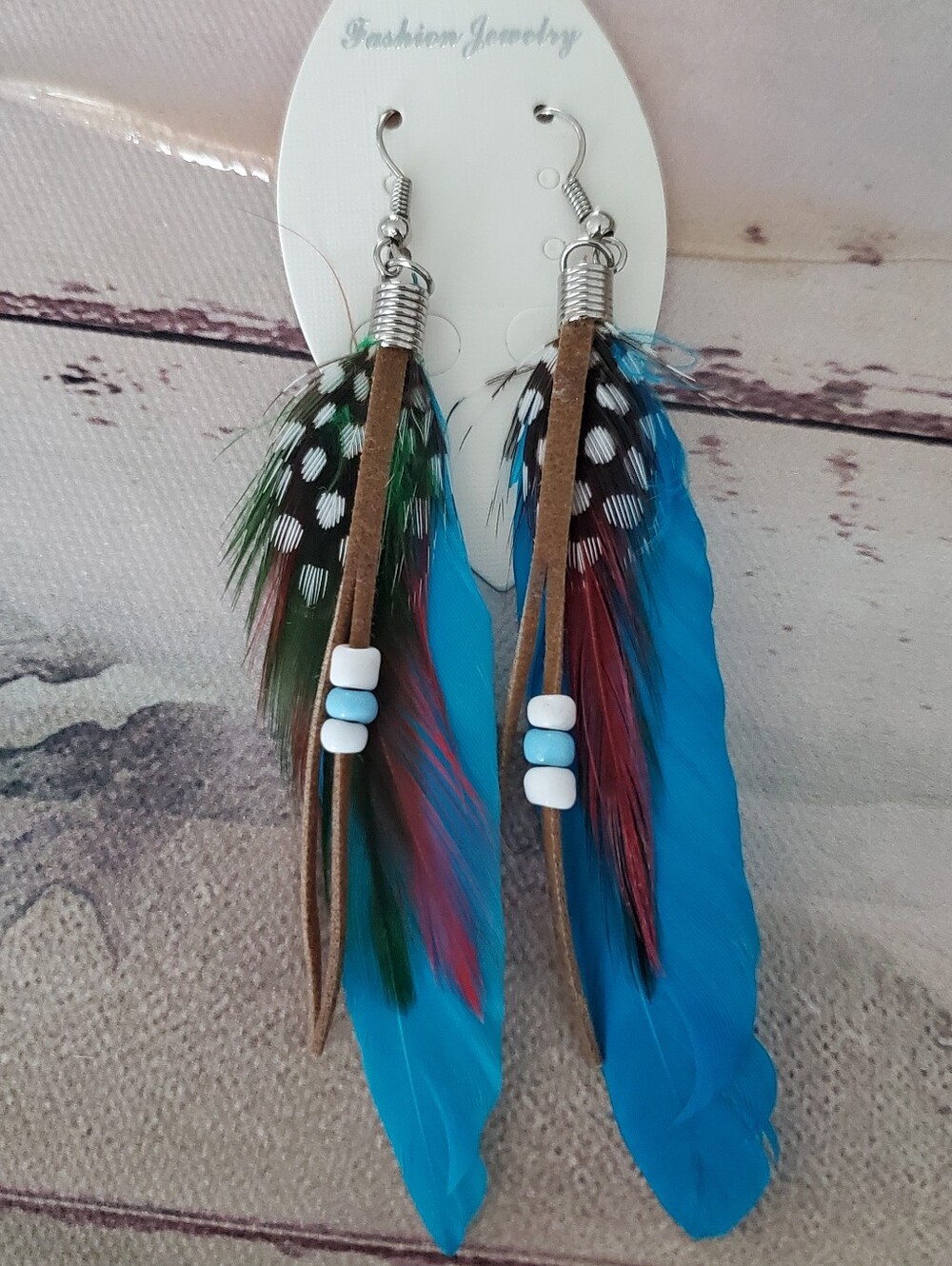 Long Light Layered Blue Feather Dangle Earrings.